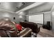 Home theater with comfortable leather recliners and a large projection screen at 4388 Cades Pointe, Marietta, GA 30066