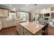 Spacious kitchen featuring granite countertops, an island with seating, and stainless steel appliances at 4388 Cades Pointe, Marietta, GA 30066