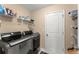 Practical laundry room with modern appliances and storage at 4388 Cades Pointe, Marietta, GA 30066