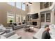 Bright living room features a stone fireplace and soaring ceilings at 4388 Cades Pointe, Marietta, GA 30066