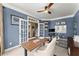 Bright home office with French doors, a ceiling fan, and a comfortable workspace at 4388 Cades Pointe, Marietta, GA 30066