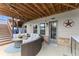 Covered patio with a seating area and an upper-level deck offers a comfortable outdoor space at 4388 Cades Pointe, Marietta, GA 30066