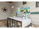Pool bar with mini fridge for drinks and lots of fun pool themed decor at 4388 Cades Pointe, Marietta, GA 30066