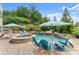 Beautiful backyard showcasing a pool, hot tub, and lush landscaping, perfect for outdoor entertaining at 4388 Cades Pointe, Marietta, GA 30066