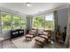 Relaxing sitting room with comfortable chairs, accent pillows, and natural light at 4388 Cades Pointe, Marietta, GA 30066