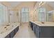 A luxurious bathroom with a large tub and double vanity at 502 Fortune Ridge Rd, Stone Mountain, GA 30087