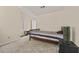 This bedroom features neutral walls and carpet with a wooden frame twin bed at 502 Fortune Ridge Rd, Stone Mountain, GA 30087