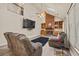 A cozy living room features a brick fireplace and built-in shelving at 502 Fortune Ridge Rd, Stone Mountain, GA 30087