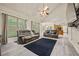 A large living room with high ceilings and modern furniture at 502 Fortune Ridge Rd, Stone Mountain, GA 30087