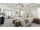 Spacious main bedroom with tray ceilings, carpet floors, and ample natural light at 47 Gloster Mill Way, Lawrenceville, GA 30044