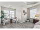 Inviting corner in the main bedroom featuring two chairs and a large window at 47 Gloster Mill Way, Lawrenceville, GA 30044