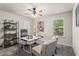 Cozy home office with neutral tones, a ceiling fan, and natural light at 47 Gloster Mill Way, Lawrenceville, GA 30044