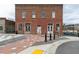 Historic red brick building with tall windows and doors, surrounded by a newly paved brick sidewalk at 508 Regency Trl, Acworth, GA 30102