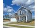 Charming two-story home with a mix of stone and siding, featuring a covered front porch and a two car garage at 508 Regency Trl, Acworth, GA 30102