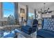 A stylish living room with modern furnishings and decor, next to a dining area and kitchen at 508 Regency Trl, Acworth, GA 30102