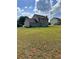 Spacious backyard with potential for outdoor activities and entertaining at 5458 Stagecoach Rd, Ellenwood, GA 30294
