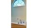 Bathroom showcasing a soaking tub with updated fixtures and a decorative window for natural light at 5458 Stagecoach Rd, Ellenwood, GA 30294