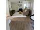 Cozy living room with new flooring at 5458 Stagecoach Rd, Ellenwood, GA 30294