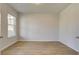 Bright bedroom with wood floors, a large window, and neutral paint for a cozy space at 76 Homesite Dulles Dr, Mcdonough, GA 30253