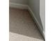 A close up on a neutral-colored carpeted room at 76 Homesite Dulles Dr, Mcdonough, GA 30253