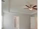 Ceiling with fan and crown moulding above a hallway at 76 Homesite Dulles Dr, Mcdonough, GA 30253