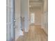 Welcoming foyer features hardwood floors, stairs, and natural light at 76 Homesite Dulles Dr, Mcdonough, GA 30253