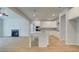 Bright, open-concept kitchen features a large island, white cabinets, modern appliances, and plenty of counter space at 76 Homesite Dulles Dr, Mcdonough, GA 30253