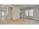 Spacious living room with stylish flooring, ample natural light, and a view of the outdoors at 76 Homesite Dulles Dr, Mcdonough, GA 30253