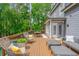 Deck features ample seating and views to the backyard and mature trees at 1100 Lady Slipper Way, Canton, GA 30115