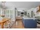 Spacious kitchen with island and a great view into the living and dining areas at 1100 Lady Slipper Way, Canton, GA 30115