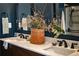 Contemporary bathroom with double sinks, marble countertops, and dark wood cabinets, offering luxury and functionality at 1320 Country Acres Ln, Lawrenceville, GA 30045