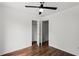 Spare bedroom with hardwood floors and ceiling fan at 1320 Country Acres Ln, Lawrenceville, GA 30045