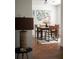 Bright dining room featuring hardwood floors and modern art, offering a warm and inviting atmosphere at 1320 Country Acres Ln, Lawrenceville, GA 30045