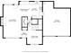 First floor plan featuring a living room, dining area, kitchen, and garage at 1320 Country Acres Ln, Lawrenceville, GA 30045