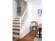 Bright foyer featuring wood staircase, hardwood floors and plenty of natural light at 1320 Country Acres Ln, Lawrenceville, GA 30045