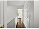 Upstairs hallway with closet doors at 1320 Country Acres Ln, Lawrenceville, GA 30045