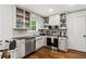 Functional kitchen with stainless steel appliances and white cabinets at 1320 Country Acres Ln, Lawrenceville, GA 30045