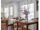 Cozy eat-in kitchen featuring natural light, breakfast table, and modern appliances at 1320 Country Acres Ln, Lawrenceville, GA 30045