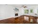 Bright living room featuring hardwood floors, fireplace and lots of natural light at 1320 Country Acres Ln, Lawrenceville, GA 30045