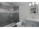 Contemporary bathroom with large shower and updated fixtures at 2100 Drew Nw Dr, Atlanta, GA 30318