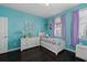 Light blue room with dark wood floors and white furniture at 2100 Drew Nw Dr, Atlanta, GA 30318