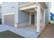 Back of house with garage, porch, and access to the backyard at 2100 Drew Nw Dr, Atlanta, GA 30318