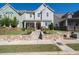 Beautiful home featuring stone accents, lush lawn, and well-maintained landscaping, creating inviting curb appeal at 2100 Drew Nw Dr, Atlanta, GA 30318