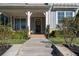 A charming front porch welcomes you with seating and a decorated front door, inviting relaxation at 2100 Drew Nw Dr, Atlanta, GA 30318