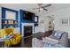 Cozy living room with a fireplace, built-in shelves, and hardwood floors, creating a warm and inviting space at 2100 Drew Nw Dr, Atlanta, GA 30318