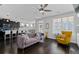 Comfortable living room features an open floor plan, hardwood floors, and lots of natural light at 2100 Drew Nw Dr, Atlanta, GA 30318