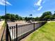Community playground with slides, climbing structures, and a secure fence, offering a safe play environment at 2100 Drew Nw Dr, Atlanta, GA 30318