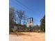 Property with signage and perimeter fencing at 2526 Panola Rd, Lithonia, GA 30058
