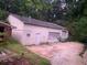 White vinyl siding and garage doors at 2526 Panola Rd, Lithonia, GA 30058