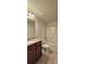 Cozy bathroom with granite countertop, integrated sink, and bathtub with shower at 5010 Lynnonhall Ct, Stonecrest, GA 30038